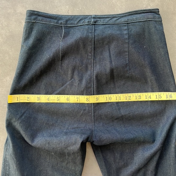 Dark soft denim. Straight leg, front pockets, no back pockets, no belt loops. - Picture 8 of 10